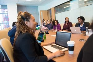 employees training around a table